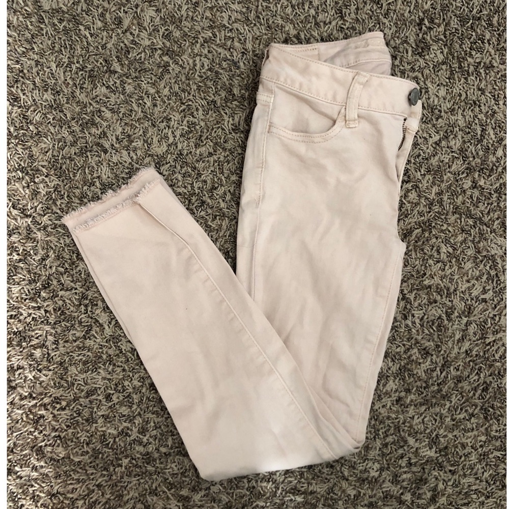 AMERICAN EAGLE PINK JEGGINGS/ DISTRESSED DENIM